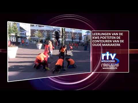 Leerlingen KWS poetsen contouren oude Mariakerk